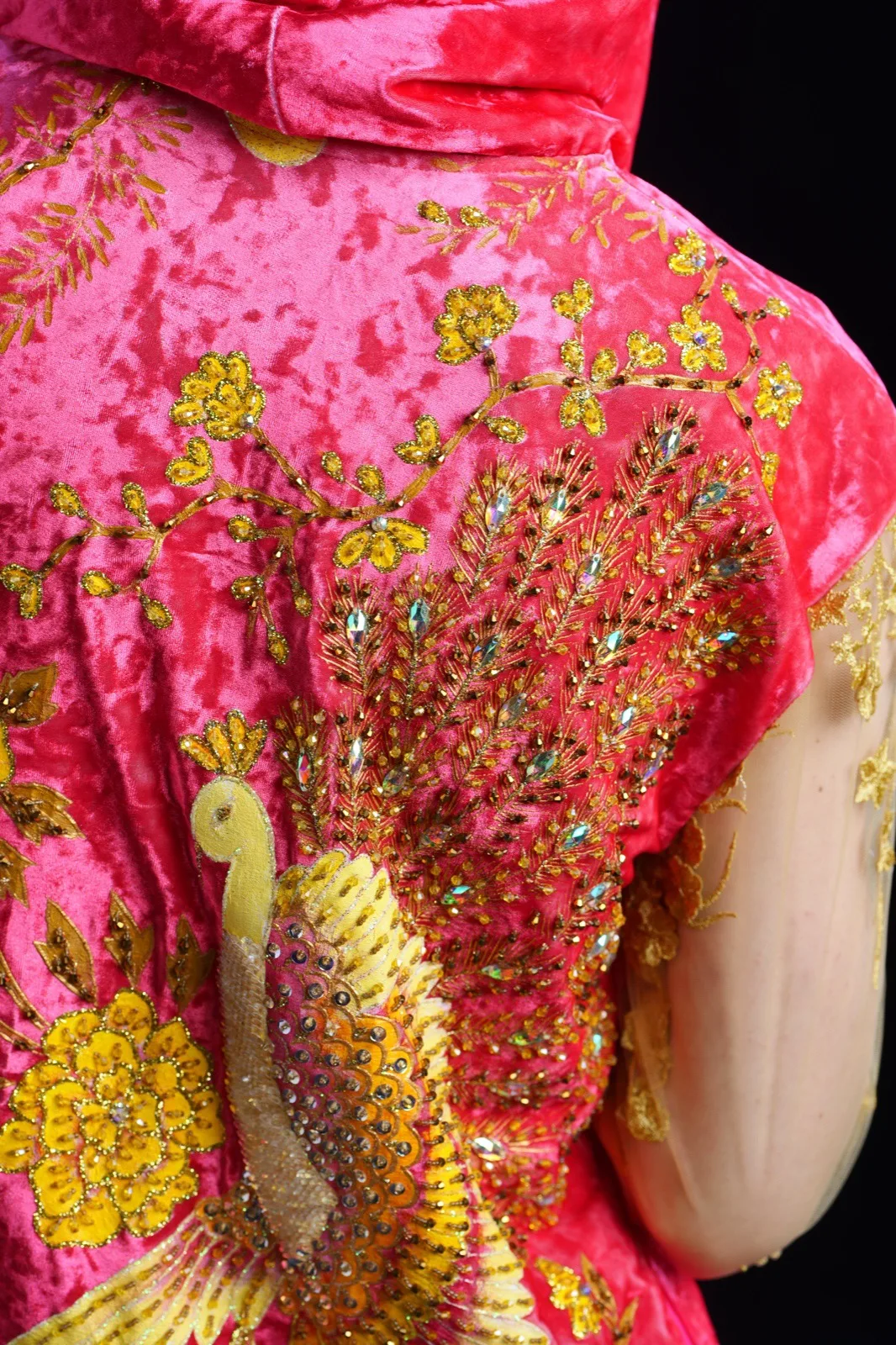 Goldwork embroidery on crushed velvet.