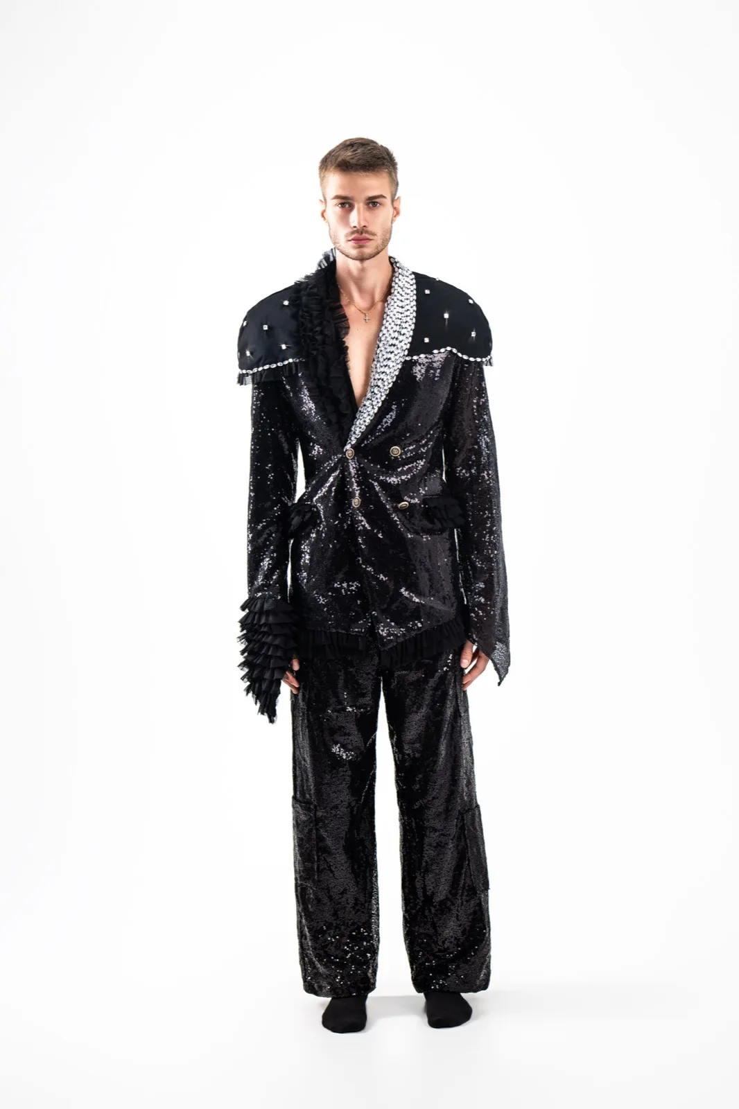Sequins, and a shawl of pearls set by hand.